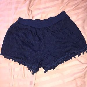 Navy blue shorts.
